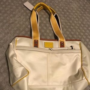Cream Coach bag